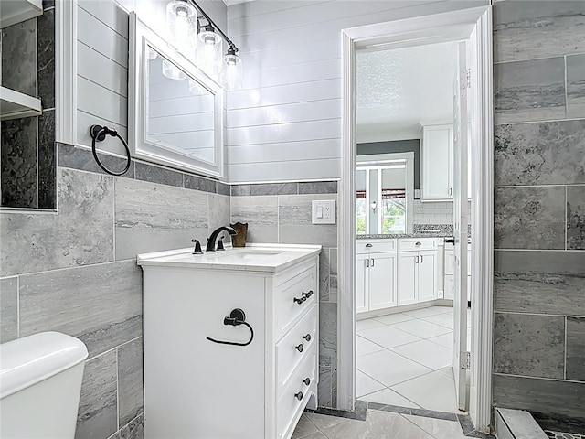 3417 Pershing Ave, Orlando, FL 32812 - bathroom with tile walls and vanity