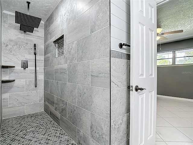3417 Pershing Ave, Orlando, FL 32812 - bathroom with tiled shower, a textured ceiling, tile patterned floors, and a ceiling fan