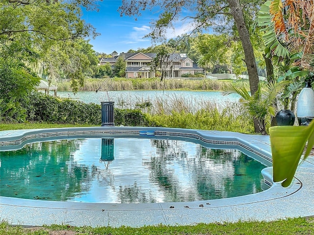 3417 Pershing Ave, Orlando, FL 32812 - outdoor pool featuring a water view and a residential view