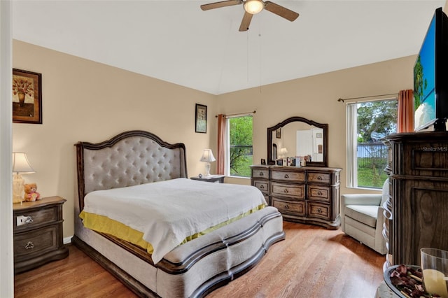 501 Lake Cummings Way, Lake Alfred, FL 33850 - bedroom featuring light wood finished floors, vaulted ceiling, and ceiling fan