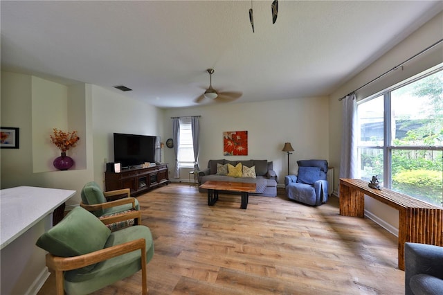 604 Timberwilde Ct, Winter Springs, FL 32708 - living room with light wood-style floors and ceiling fan