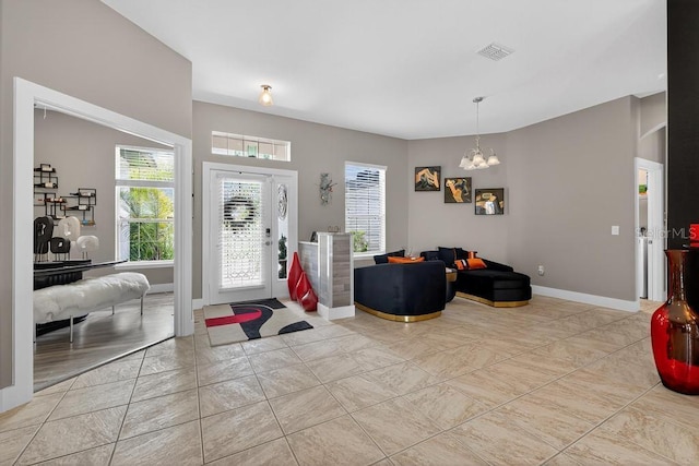 533 Quail Down Dr, Debary, FL 32713 - entrance foyer with a chandelier and baseboards