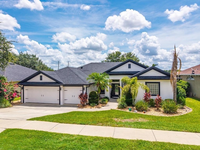 533 Quail Down Dr, Debary, FL 32713 - single story home with a garage, a front yard, stucco siding, and driveway