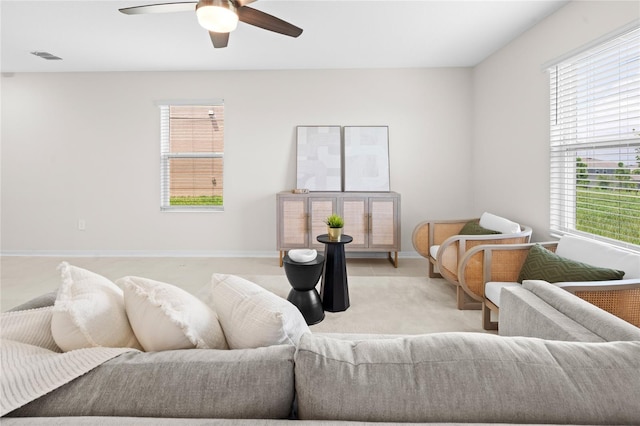 2817 Muller Oak Loop, Ocoee, FL 34761 - living room with light carpet, healthy amount of natural light, and a ceiling fan