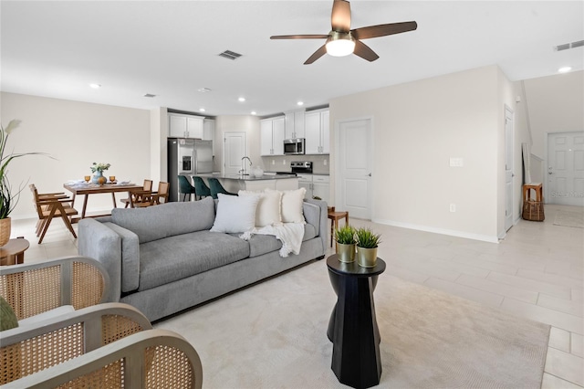 2817 Muller Oak Loop, Ocoee, FL 34761 - living area featuring a ceiling fan, recessed lighting, and light tile patterned flooring