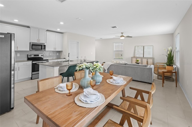2817 Muller Oak Loop, Ocoee, FL 34761 - dining space featuring plenty of natural light, ceiling fan, recessed lighting, and light tile patterned floors