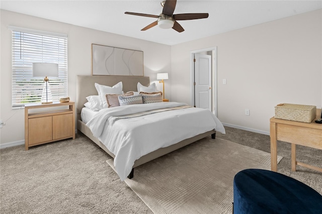 2817 Muller Oak Loop, Ocoee, FL 34761 - bedroom featuring light colored carpet, multiple windows, and ceiling fan