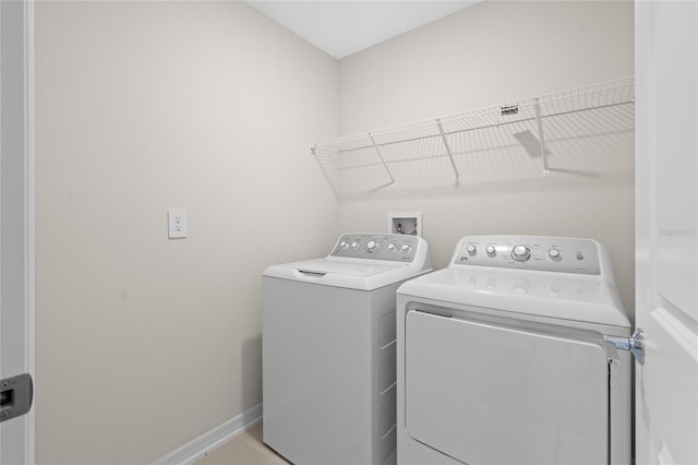 2817 Muller Oak Loop, Ocoee, FL 34761 - washroom featuring separate washer and dryer and baseboards