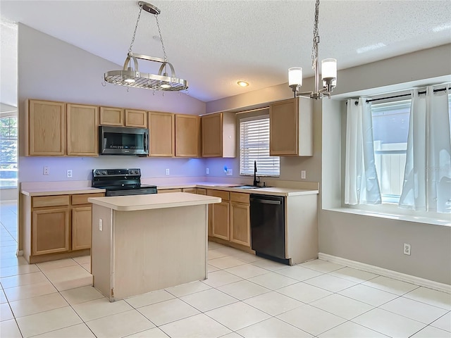 12938 Maribou Cir, Orlando, FL 32828 - kitchen with stainless steel microwave, range with electric cooktop, dishwashing machine, light countertops, and a textured ceiling