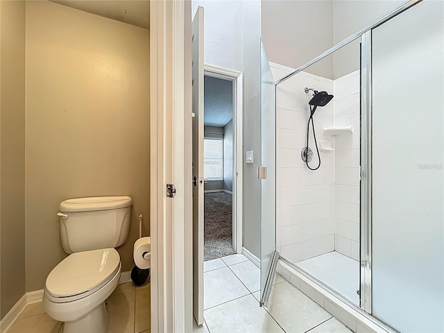 12938 Maribou Cir, Orlando, FL 32828 - bathroom featuring a shower stall and tile patterned floors
