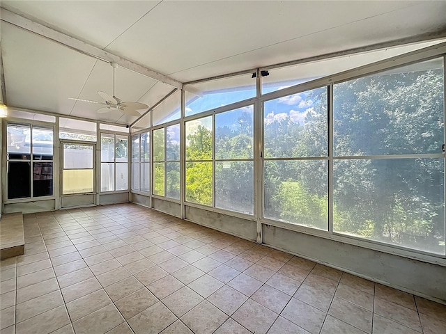12938 Maribou Cir, Orlando, FL 32828 - unfurnished sunroom with ceiling fan and lofted ceiling
