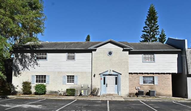 3057 Aaron Burr Ave Unit 1, Winter Park, FL 32792 - view of property featuring uncovered parking