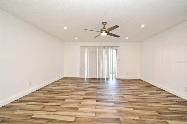 3057 Aaron Burr Ave Unit 1, Winter Park, FL 32792 - empty room with ceiling fan, wood finished floors, and recessed lighting