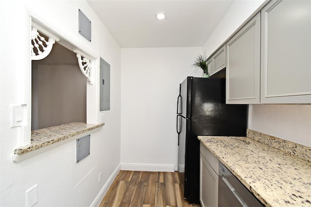 3057 Aaron Burr Ave Unit 1, Winter Park, FL 32792 - kitchen with gray cabinets, dark wood-type flooring, electric panel, and freestanding refrigerator