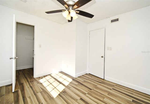 3057 Aaron Burr Ave Unit 1, Winter Park, FL 32792 - empty room with light wood-style floors and ceiling fan