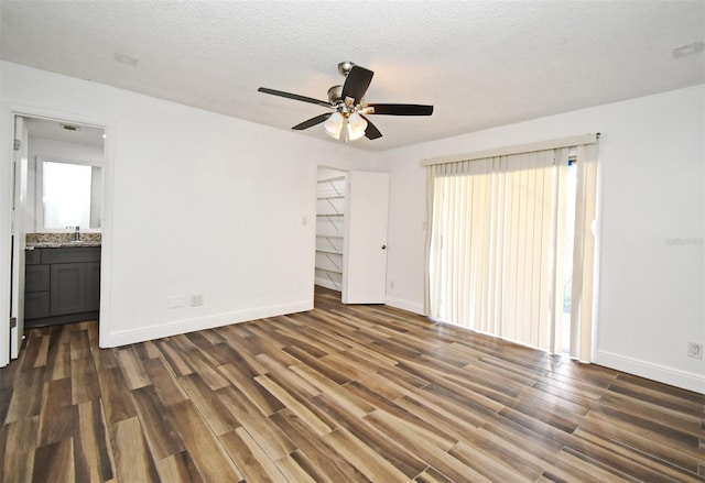 3057 Aaron Burr Ave Unit 1, Winter Park, FL 32792 - empty room featuring wood finished floors, a ceiling fan, plenty of natural light, and a textured ceiling