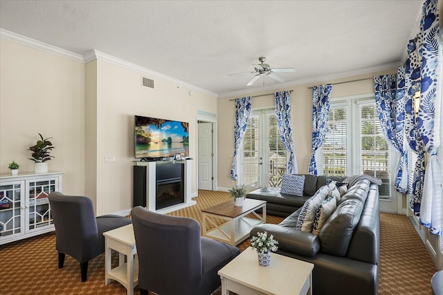 7509 Mourning Dove Cir Unit 204, Reunion, FL 34747 - living room featuring carpet floors, a ceiling fan, and crown molding