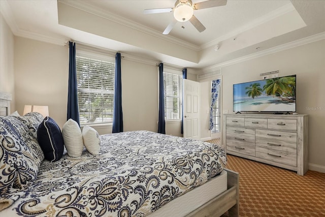 7509 Mourning Dove Cir Unit 204, Reunion, FL 34747 - bedroom with a raised ceiling, crown molding, carpet, and a ceiling fan