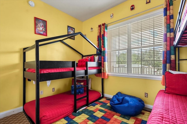 7509 Mourning Dove Cir Unit 204, Reunion, FL 34747 - carpeted bedroom with baseboards