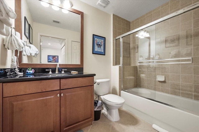 7509 Mourning Dove Cir Unit 204, Reunion, FL 34747 - full bath with vanity, tile patterned floors, and shower / bath combination with glass door