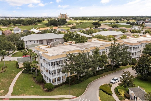 7509 Mourning Dove Cir Unit 204, Reunion, FL 34747 - aerial view of a golf course and apartment complex / building