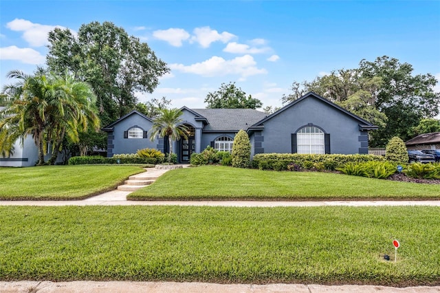 315 Lake Rd, Lake Mary, FL 32746 - single story home featuring stucco siding and a front lawn