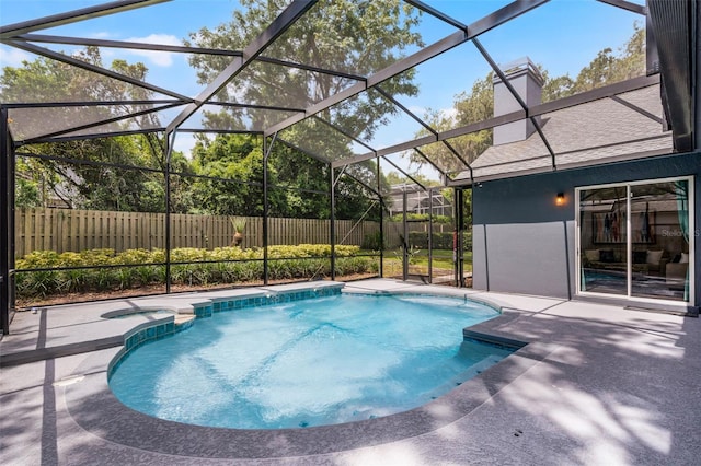 315 Lake Rd, Lake Mary, FL 32746 - view of pool featuring a pool with connected hot tub, a patio area, and a lanai