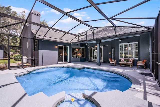 315 Lake Rd, Lake Mary, FL 32746 - swimming pool with a ceiling fan, a jacuzzi, a patio, outdoor lounge area, and a lanai