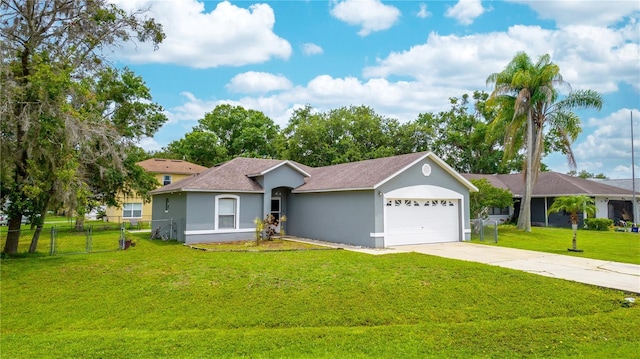 339 Colony Ct, Kissimmee, FL 34758 - single story home featuring stucco siding, driveway, an attached garage, and roof with shingles