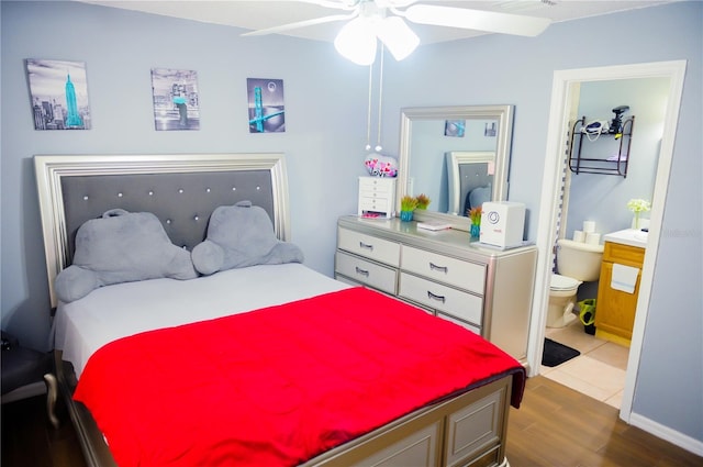 339 Colony Ct, Kissimmee, FL 34758 - bedroom with wood finished floors and ensuite bathroom