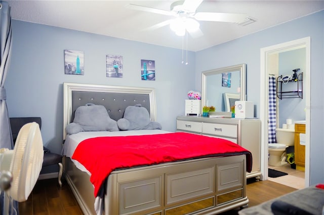 339 Colony Ct, Kissimmee, FL 34758 - bedroom featuring wood finished floors, ensuite bathroom, and ceiling fan