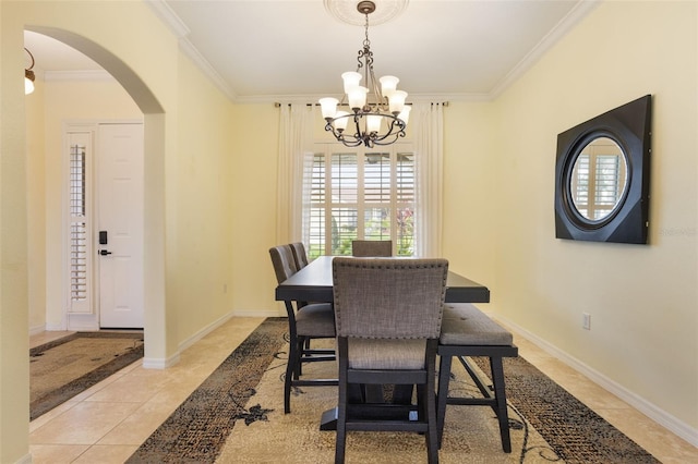 930 Willow Oak Loop, Minneola, FL 34715 - dining space with arched walkways, a chandelier, ornamental molding, and light tile patterned floors