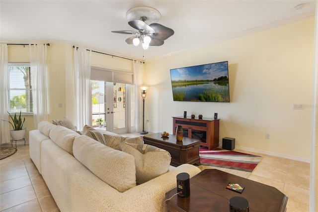 930 Willow Oak Loop, Minneola, FL 34715 - living room with light tile patterned floors, ceiling fan, and crown molding