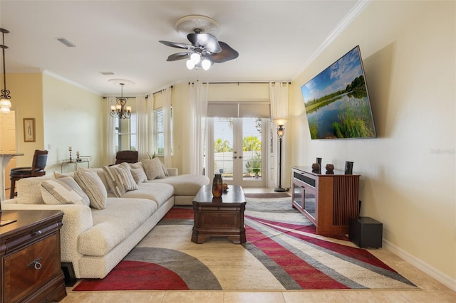 930 Willow Oak Loop, Minneola, FL 34715 - tiled living room with french doors, ceiling fan, ornamental molding, and a chandelier