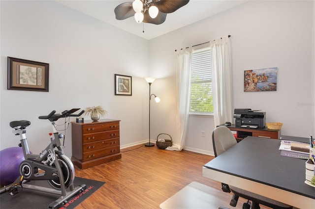 930 Willow Oak Loop, Minneola, FL 34715 - home office with a ceiling fan and light wood-style flooring