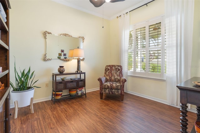 930 Willow Oak Loop, Minneola, FL 34715 - living area featuring wood finished floors, ceiling fan, and ornamental molding