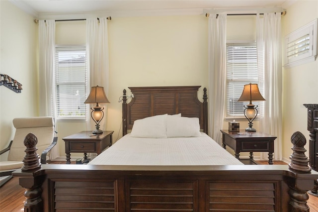 930 Willow Oak Loop, Minneola, FL 34715 - bedroom featuring wood finished floors and crown molding