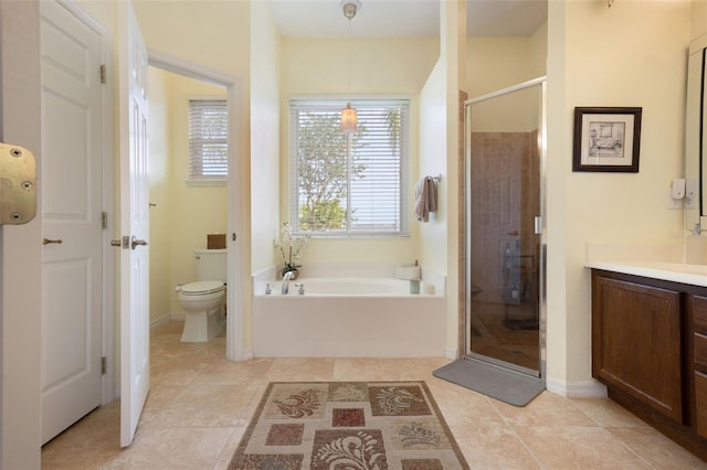 930 Willow Oak Loop, Minneola, FL 34715 - bathroom with a garden tub, a stall shower, vanity, and tile patterned floors
