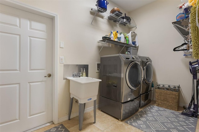 930 Willow Oak Loop, Minneola, FL 34715 - washroom with washing machine and dryer and tile patterned floors