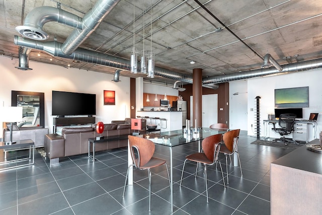 10 N Summerlin Ave Unit 14, Orlando, FL 32801 - dining area with dark tile patterned flooring