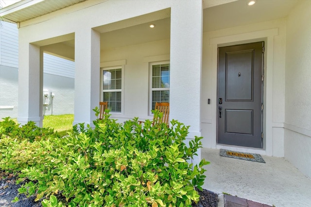 2149 Tudor Rose Dr, Sanford, FL 32773 - property entrance featuring stucco siding