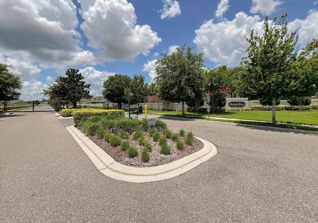 2149 Tudor Rose Dr, Sanford, FL 32773 - view of asphalt street featuring curbs