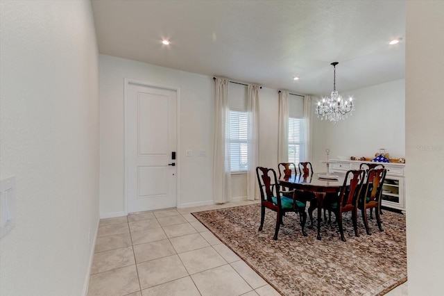 2149 Tudor Rose Dr, Sanford, FL 32773 - dining room with a chandelier, light tile patterned floors, and recessed lighting