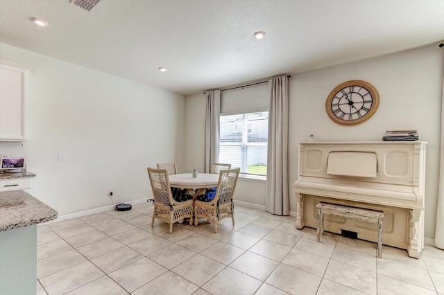 2149 Tudor Rose Dr, Sanford, FL 32773 - dining space featuring light tile patterned floors and recessed lighting