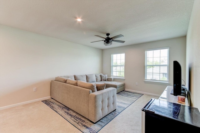 2149 Tudor Rose Dr, Sanford, FL 32773 - living area with carpet flooring, ceiling fan, and a textured ceiling