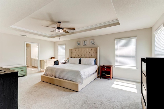 2149 Tudor Rose Dr, Sanford, FL 32773 - bedroom featuring a raised ceiling, carpet floors, and multiple windows