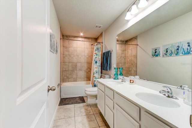 2149 Tudor Rose Dr, Sanford, FL 32773 - bathroom featuring double vanity, tile patterned floors, and shower / bath combo