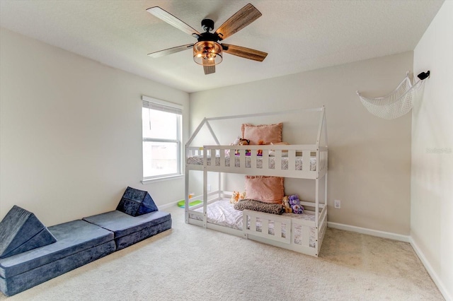 2149 Tudor Rose Dr, Sanford, FL 32773 - carpeted bedroom featuring ceiling fan and a textured ceiling