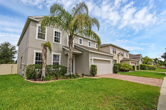 3472 Gretchen Dr, Ocoee, FL 34761 - view of front facade with stucco siding, driveway, and an attached garage