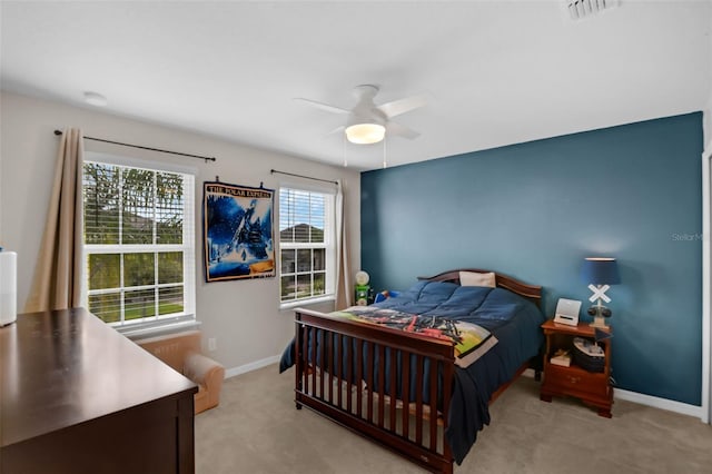 3472 Gretchen Dr, Ocoee, FL 34761 - bedroom with light colored carpet and ceiling fan
